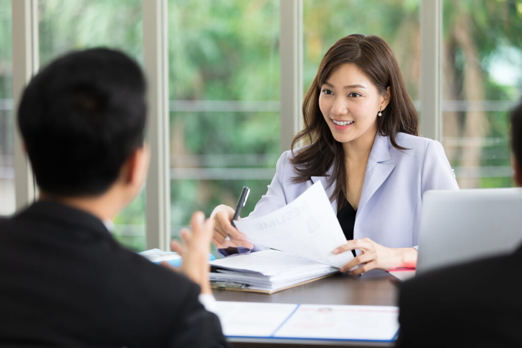 a human resource head talking to candidates