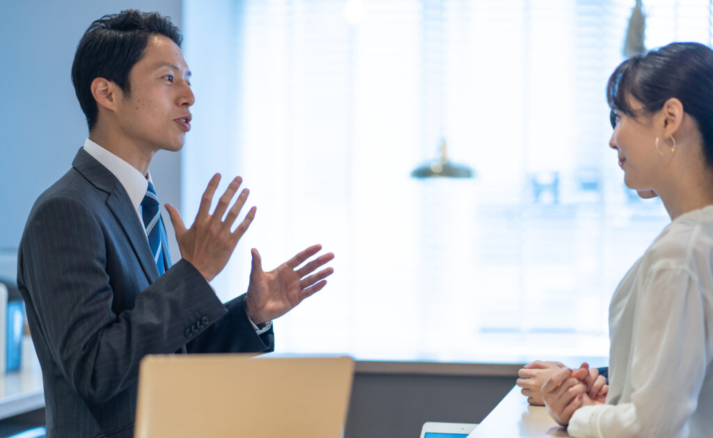 a hotelier talking to staffs