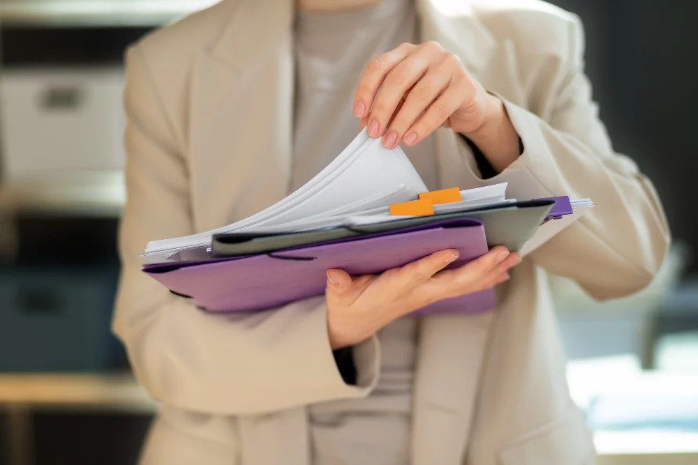 person organizing documents