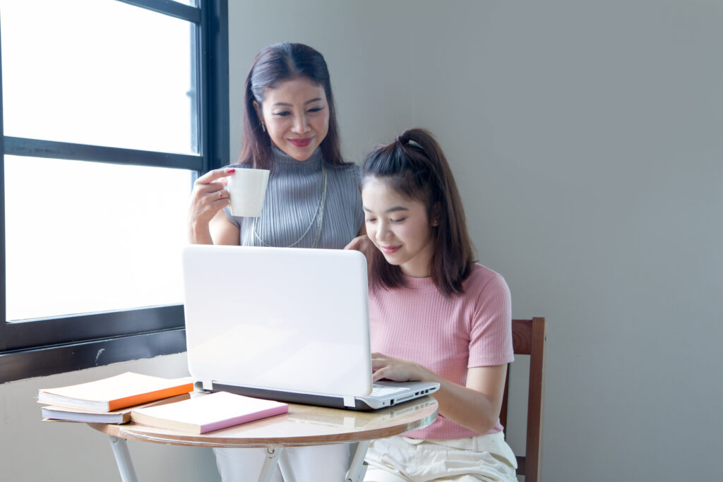mother and daughter studying