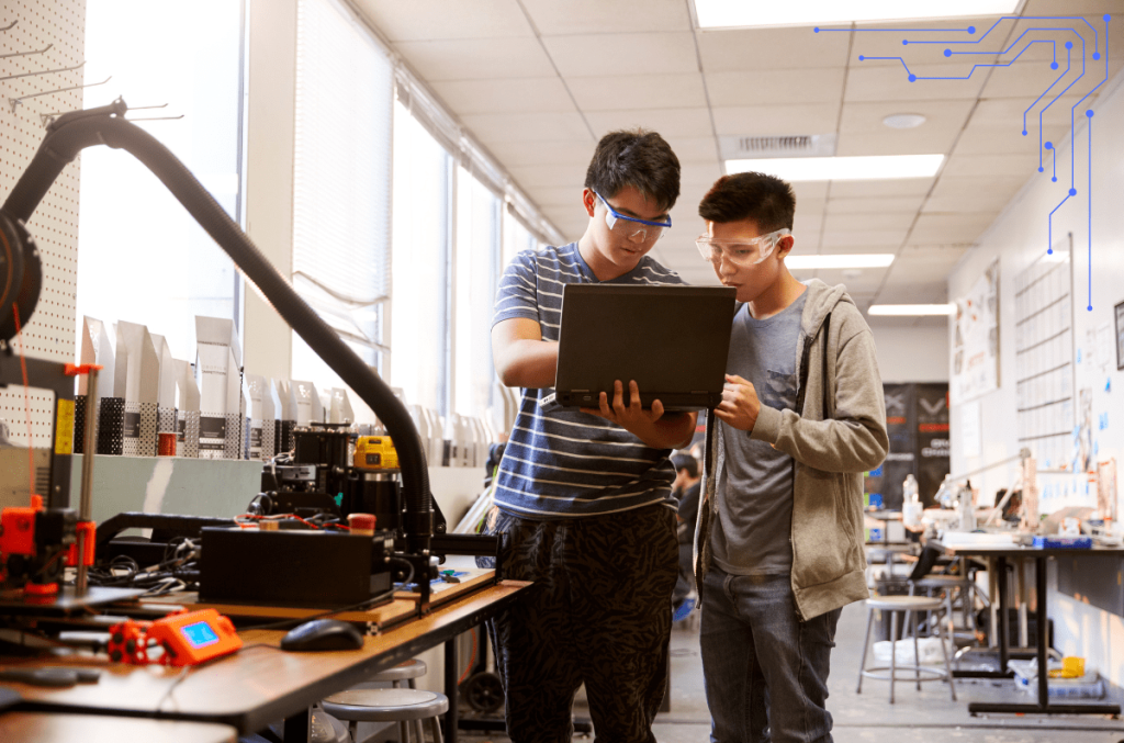 STEM students examining a robot
