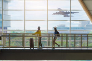 international students walking on an airport