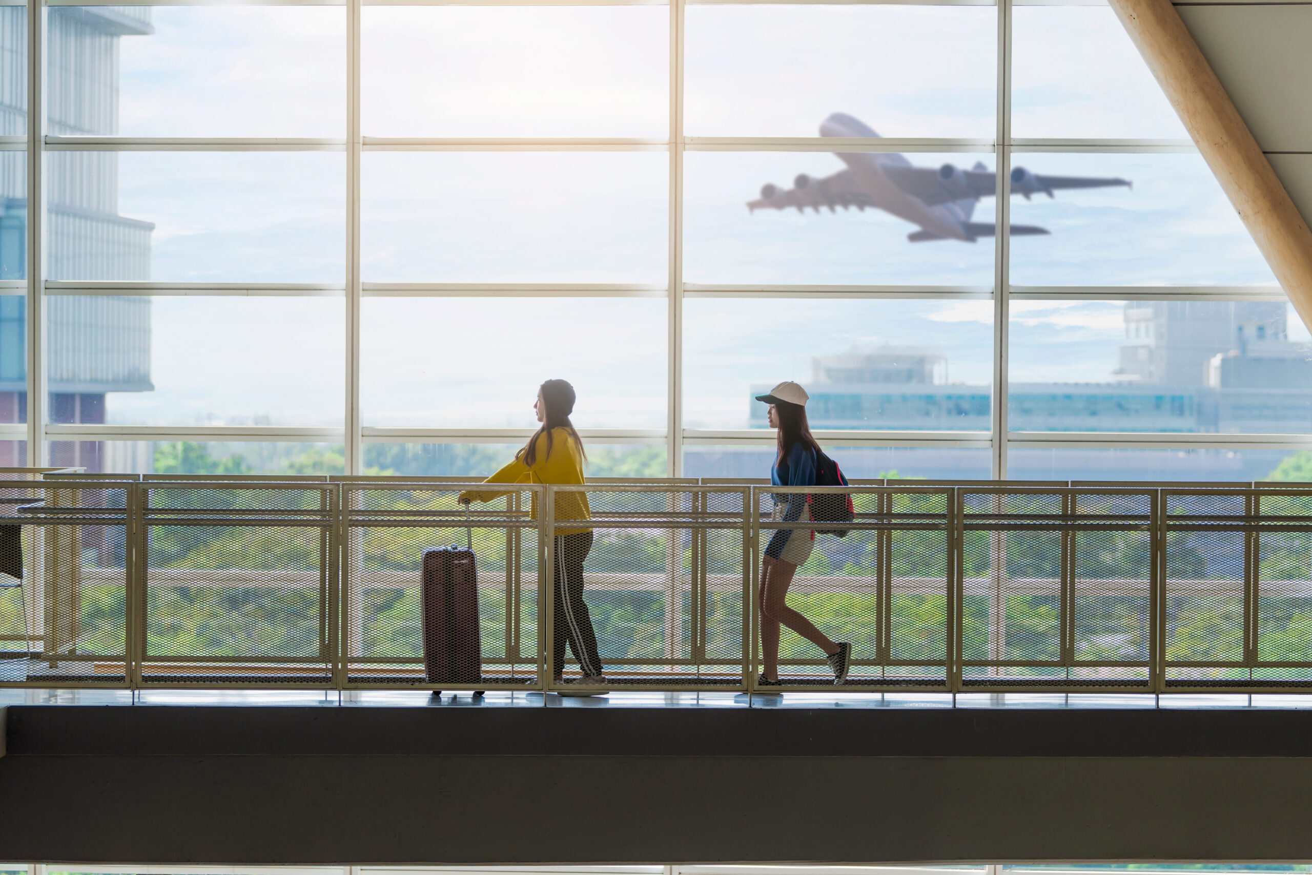 international students walking on an airport