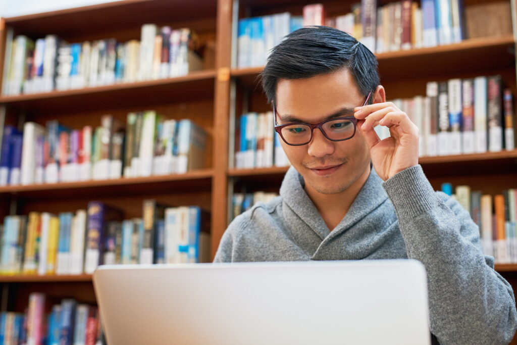 a freelance web developer using a laptop