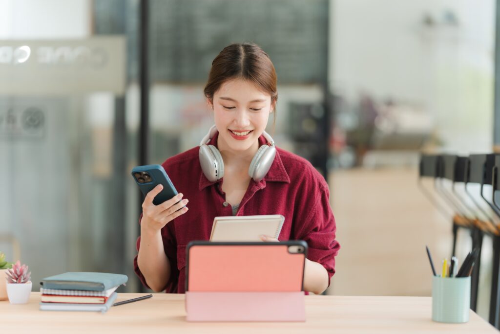 an ICT professional studying her notes