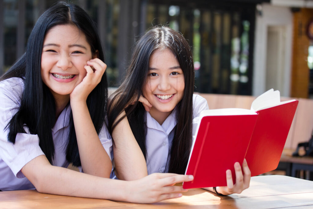 two students smiling