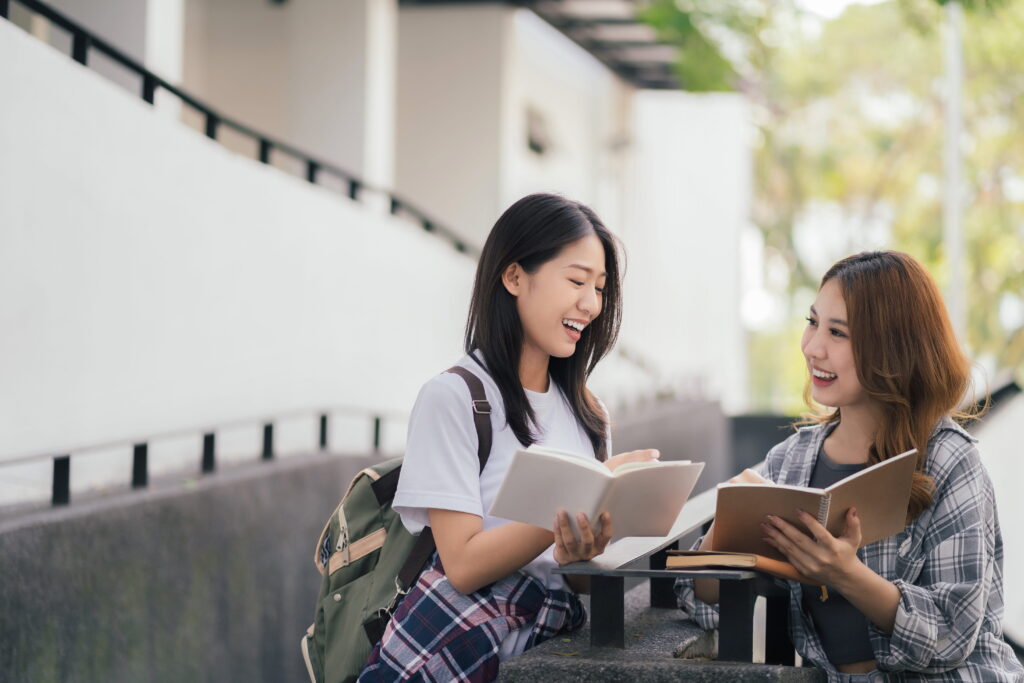 psychology students exchanging notes
