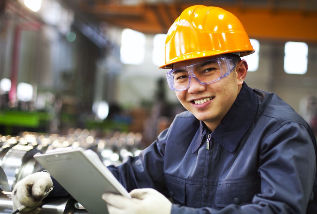 an engineer holding a checklist board