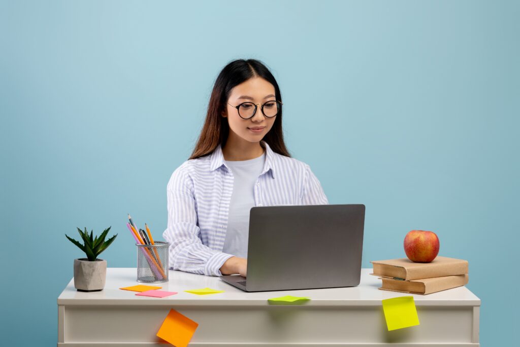 an SHS student using her laptop