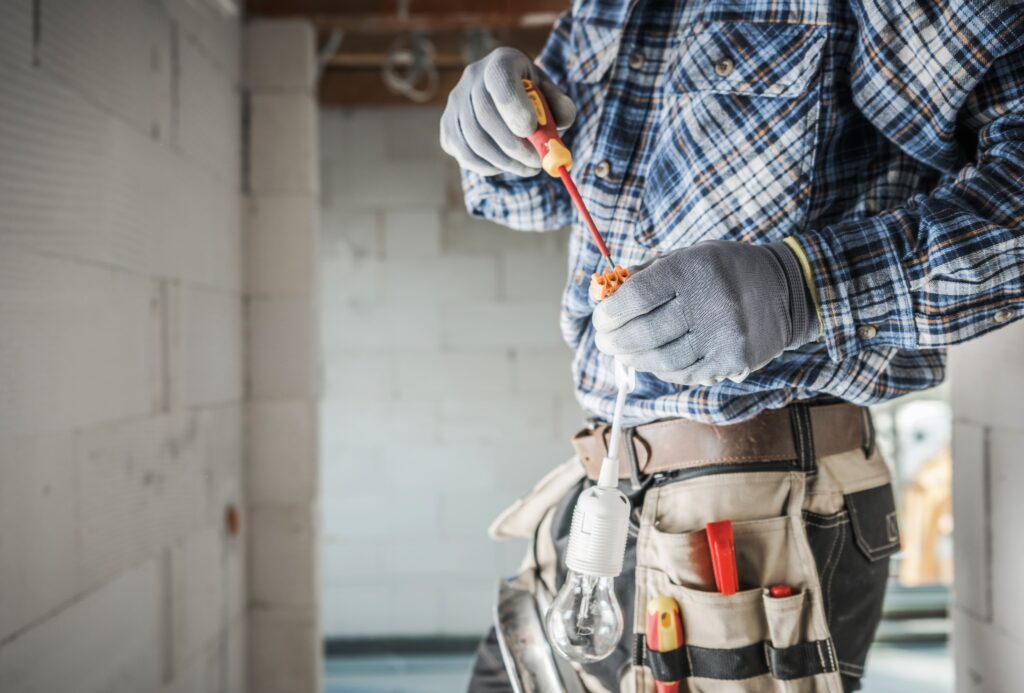 an electrician working on a site